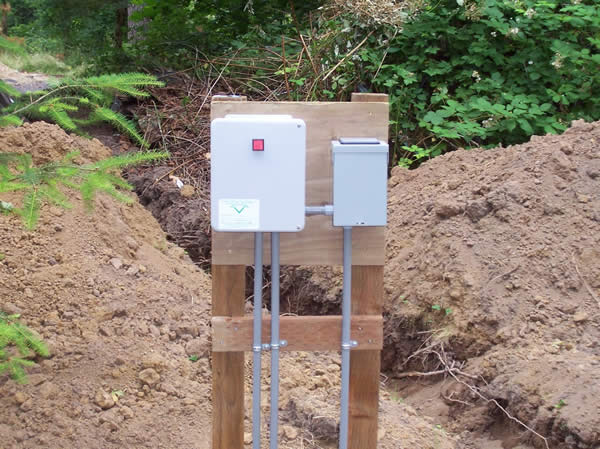 The control panel for a typical pressure distribution system (NOTE: these are oftentimes mounted on the side of the building, near the tanks)