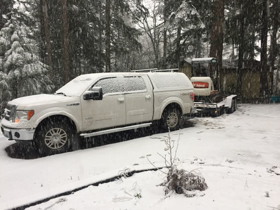 EGSD at a customer's property after digging test holes in the snow.